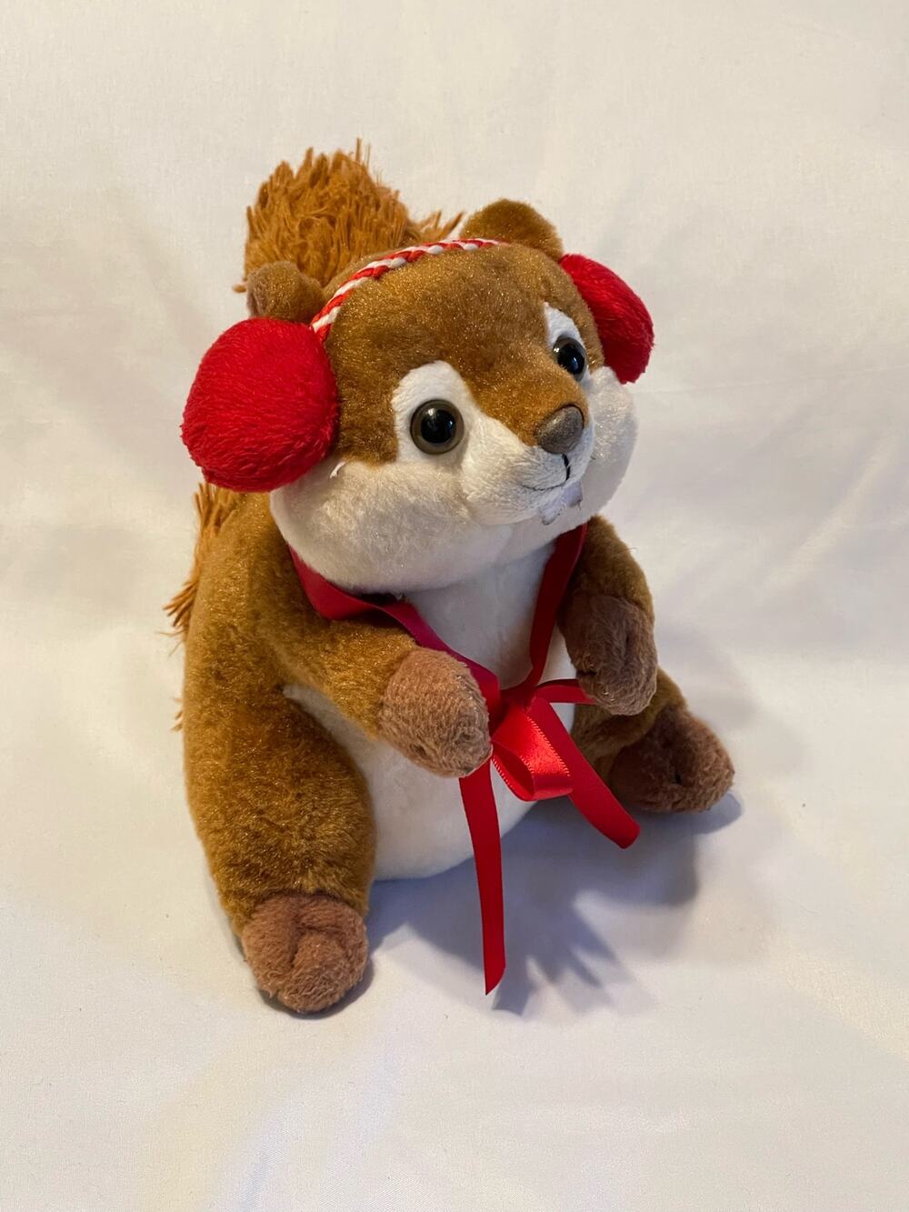 The Frankford Holiday Squirrel Plush with Red Ear Muffs
